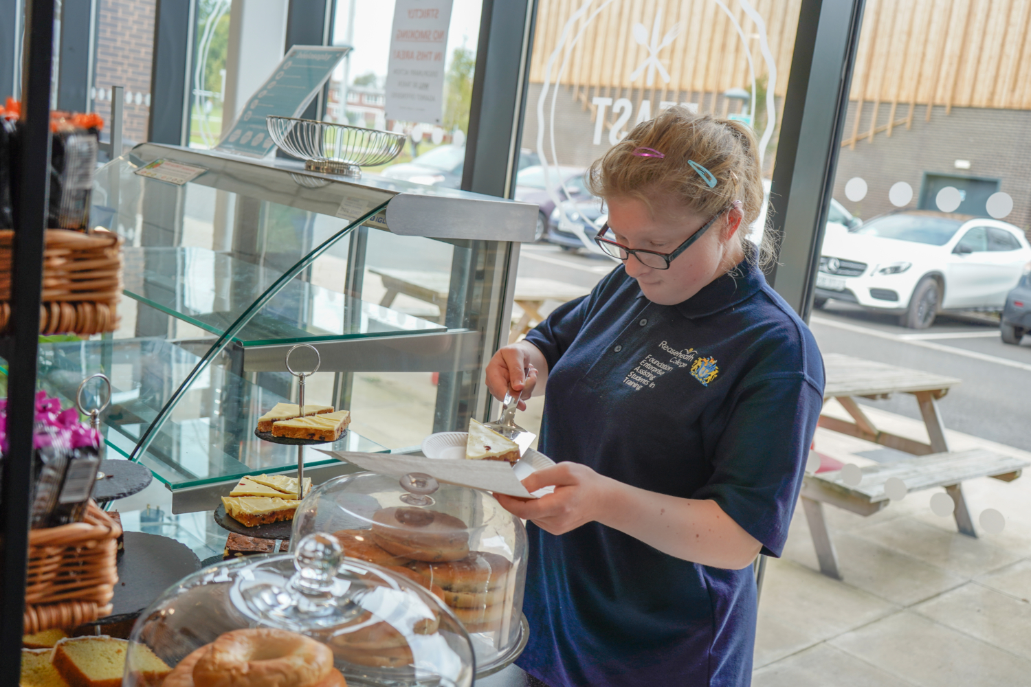 Student working in FEAST Cafe - Reaseheath College