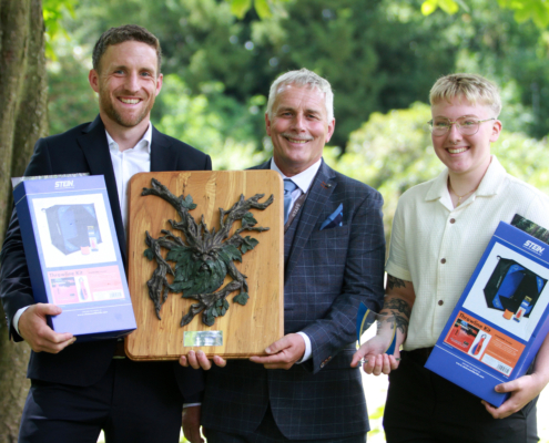 Forestry and Arboriculture students Jon Bowden, winner of the Rob Rowlinson Award for the Best Overall Student, and Jess Wilson, winner of the Award for Endeavour and Progress, with lecturer Alan Mottram (centre).