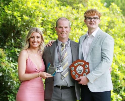 13. Design, Surveying and Planning for Construction students Phillipa Jones, who received the Together Award for Winner of the Together Bungalow Design and Harvey Bennett, winner of The Pochin Award for Best Work Experience Student Sponsored by Together, with Lecturer Phillip Greer.